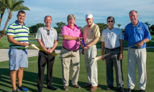 The celebrate the opening of the redesigned championship golf course, executives of The Naples Beach Hotel & Golf Club are seen here during the ceremonial ribbon-cutting. Pictured from the resort are (from left):  Golf Course Grounds Superintendent Holden Jones, General Manager Jason Parsons, Co-Owner of the resort Henry B. Watkins III, Co-Owner and President of the resort Michael Watkins, Vice President Azi Azami, and Head Golf Professional and Director of Golf George Willard.