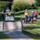 Golfers make their way along the course at Owensboro Country Club