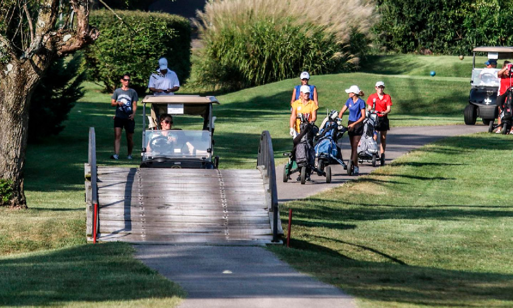 Golfers make their way along the course at Owensboro Country Club