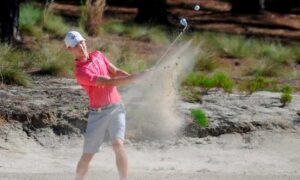 Louis Dobbelaar from Australia hits out of the sand in the first round at the North & South Championship at Pinehurst No. 2, June 2017. Ted Fitzgerald/The Pilot