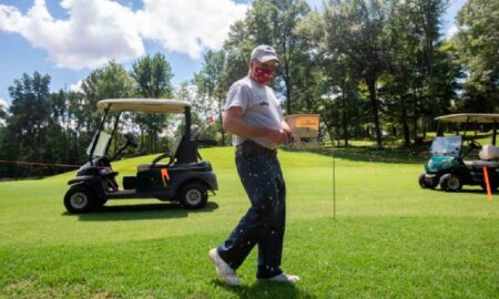 Photos by Cheyenne Boone/The Herald Buffalo Trace Golf Course Superintendent Philip Volz spreads Bermuda grass seeds at the course in Jasper on Tuesday. He has worked at the course for 39 years and will retire in August. "Out of the 39 years I've worked here, I've only been hit with a golf ball once," Volz said.