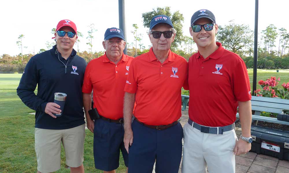 Photo ID (L-R) Jared Wilson, Naples Lakes Veteran Outreach Coordinator, John Harrison and Pat Laird, co-chairs of the Home Base Golf Tournament and Jason Cooper, Assistant Director, Development for Home Base of SW Florida.