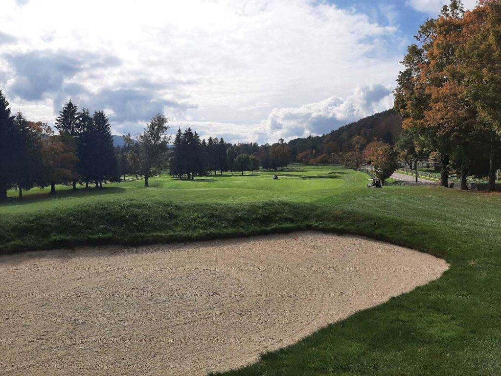 BUNKERS PEPPER THE FAIRWAY AT THE PAR-5 FOURTH - Leatherstocking Golf Course