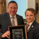 Michael Holyk (left) accepts 2021 GPOTY from Chapter President Alex Witt (Credit Colin Tucker.DesertChapterPGA)