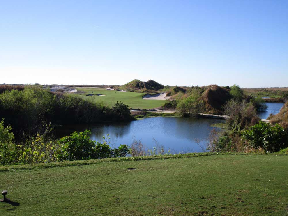 THE OPENING TEE SHOT OF COORE AND CRENSHAW'S RED COURSE