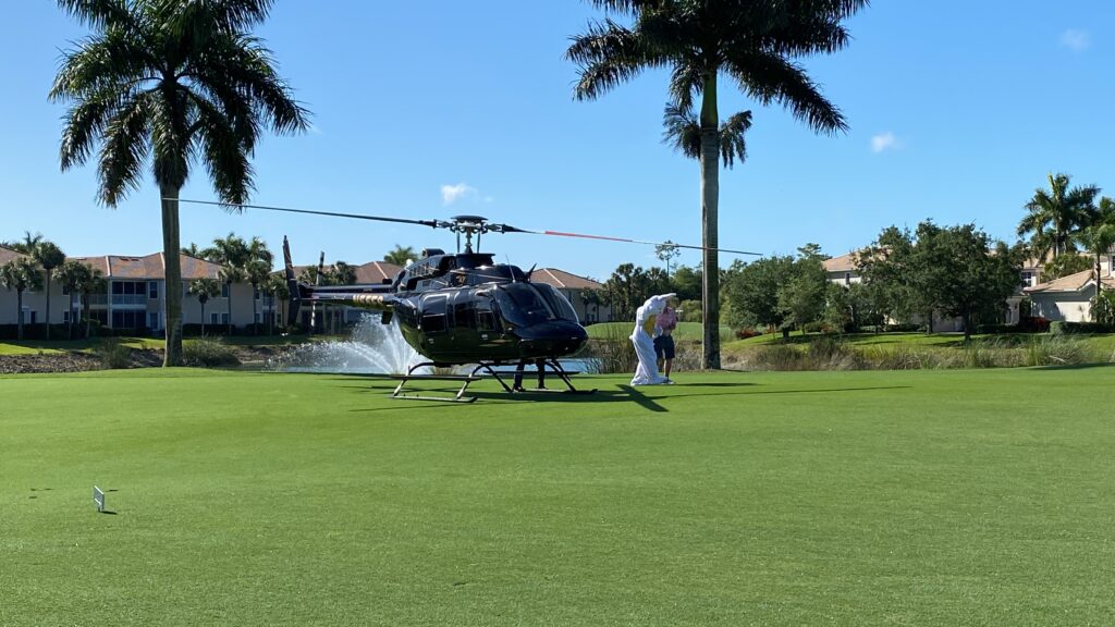 The Easter Bunny was led from the chopper to the waiting crowds at Naples Lakes Country Club