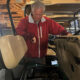 News Photo by Steve Schulwitz Course Superintendent Steve Goike checks on the motor of one of the course’s 55 golf carts while at work on Tuesday. He said for the most part, customers take care of the carts, but from time to time they get damaged from misuse.