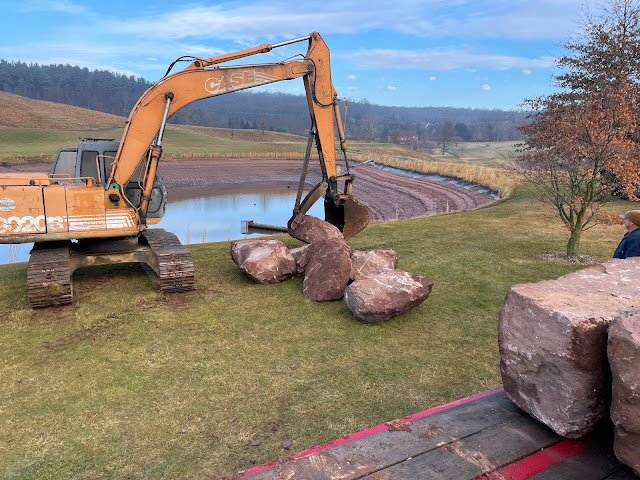 Unloading the boulders LedgeRock Golf Club