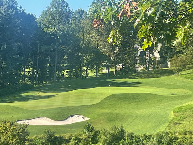 Slight bunker washout on new bunker on 17 from Hurricane Ida showing how well the liners work preventing washouts while keeping the sand clean even after more than 6" of rain