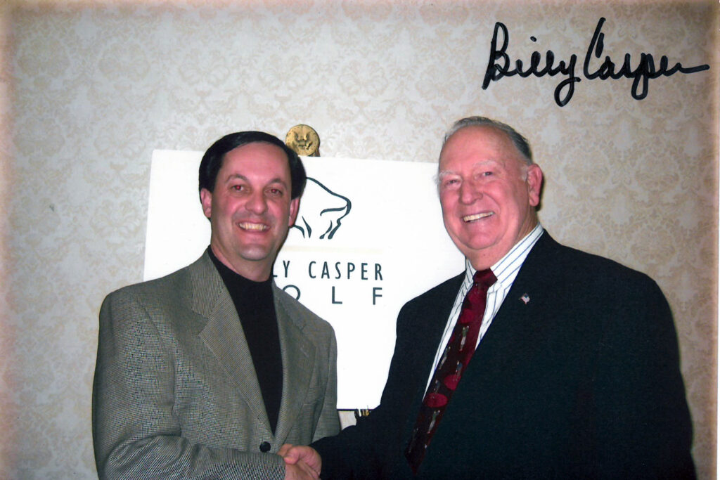 Bruce Christy Accepting National Merchandiser of the Year Award from Billy Casper