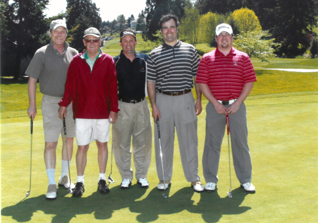 Bruce Christy (middle) at Fivesome Tournament. Second from left is Blaine Newnham, longtime Seattle Times Golf Writer, and second from right is White Horse Superintendent, Erik Linsenmayer