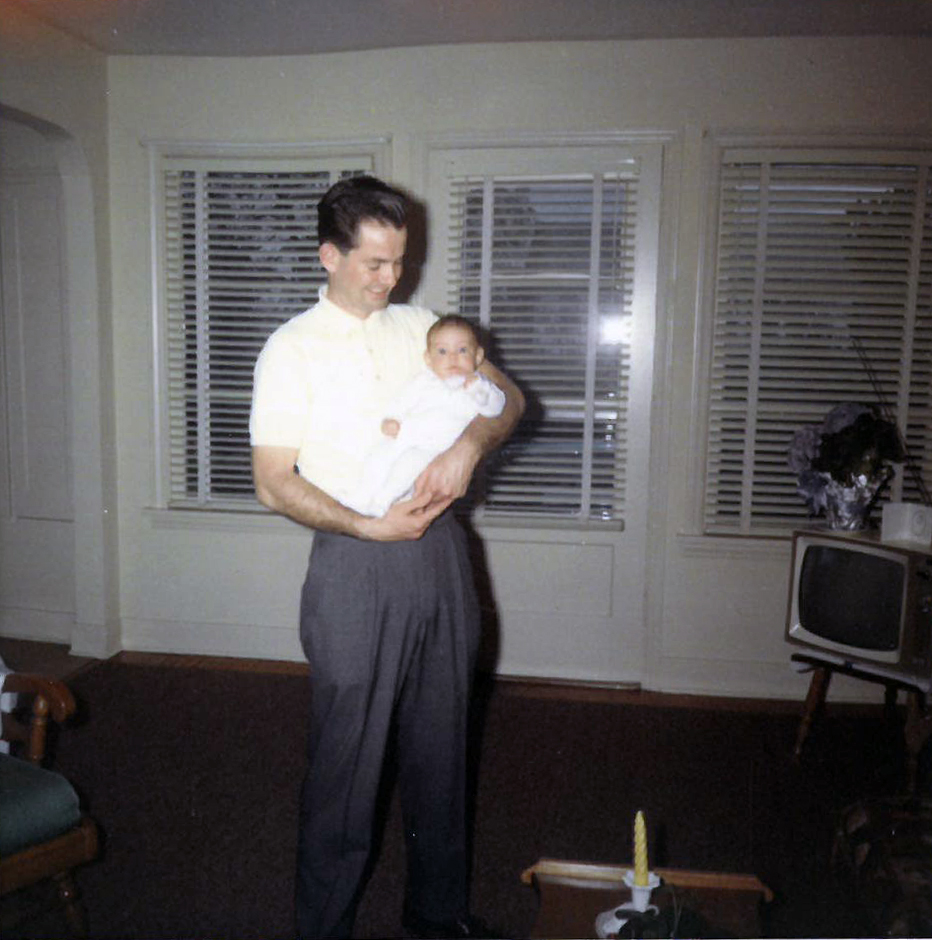 George Christy Holding His Baby Son Bruce