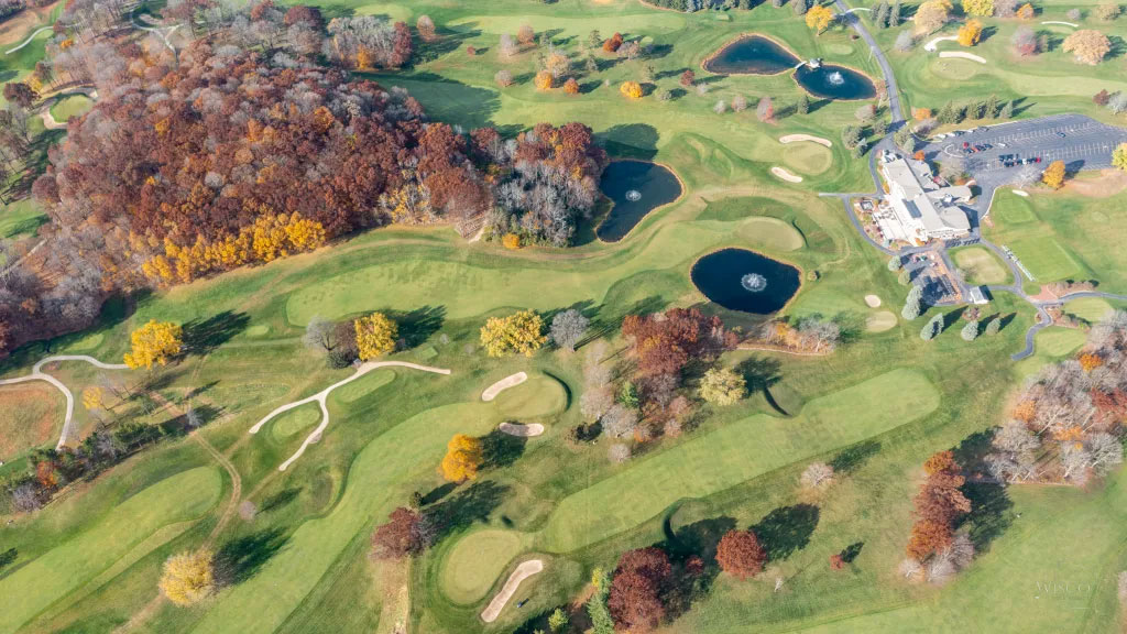 The 10th (bottom, between the tree line) playing uphill