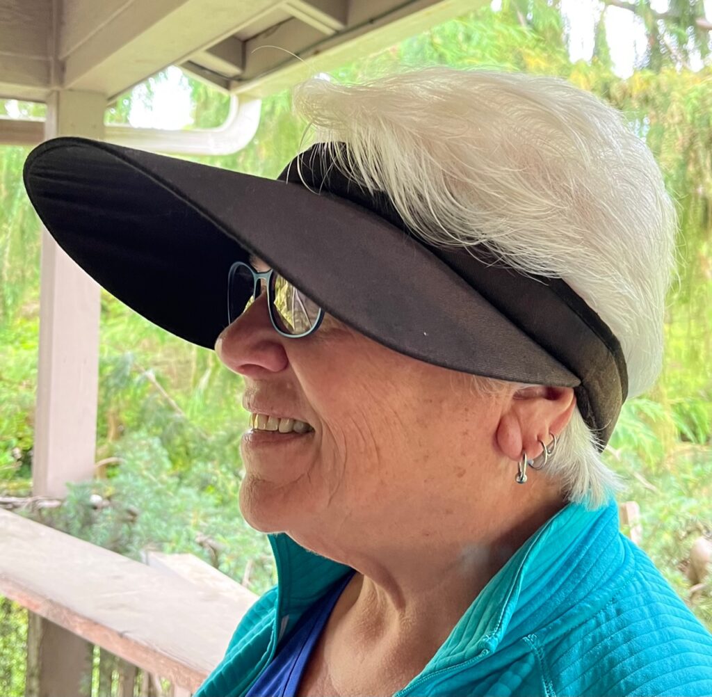 Jeff Shelley's wife, Anni, in women's visor