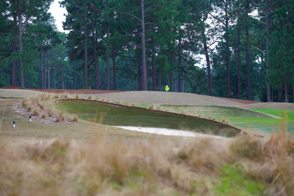 Great looking sod bunkers guard the approach to no. 9 green.
