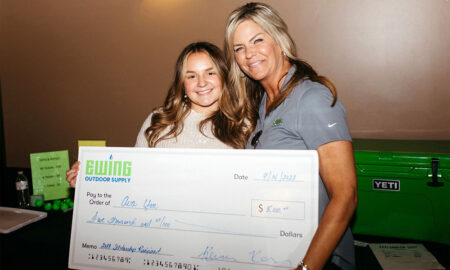 Tina Bausick Ewing sales representative presented checks for $5,000 each to golf course turf management major Ava Yon