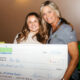 Tina Bausick Ewing sales representative presented checks for $5,000 each to golf course turf management major Ava Yon