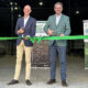 DLF's Soren Halbye and Neil Douglas Cutting Ribbon at New Facility