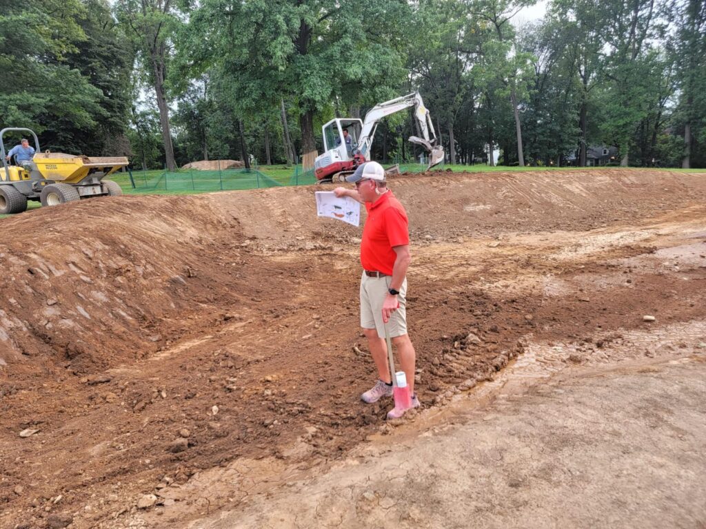 In a bunker at Phladelphia CC by Brett Nagy of Mottin Golf