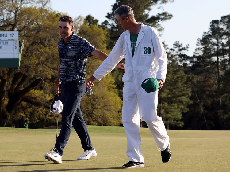 Scotty Scheffler and Ted Scott exiting the 18th Green after Winning the 2024 Masters