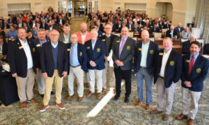 Carolinas GCSA board members flank Bob Farren, CGCS, third from left, during a conference at Pinehurst Resort where it was announced he would receive the association’s highest honor