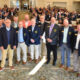 Carolinas GCSA board members flank Bob Farren, CGCS, third from left, during a conference at Pinehurst Resort where it was announced he would receive the association’s highest honor