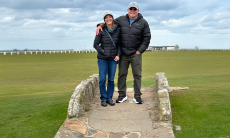 Karen & Mark Miller Pose on the Swilcan Bridge and the Old Course