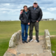 Karen & Mark Miller Pose on the Swilcan Bridge and the Old Course