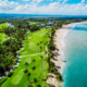 St Regis Bahia Beach Golf Course aerial view of No. 18 and ocean.