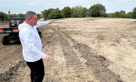 Finkbine Golf Course General Manager Josh Clay explains the design of holes 10 and 11 at the reimagined course, now under construction in Iowa City.