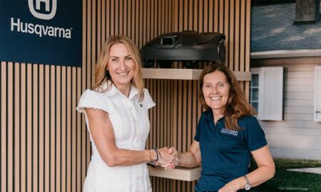 Yvette Henshall-Bell, President, Husqvarna Forest & Garden Division shaking hands with Jackie Davidson, Director - Golf Education at The R&A following the signing of The R&A Women in Golf Charter